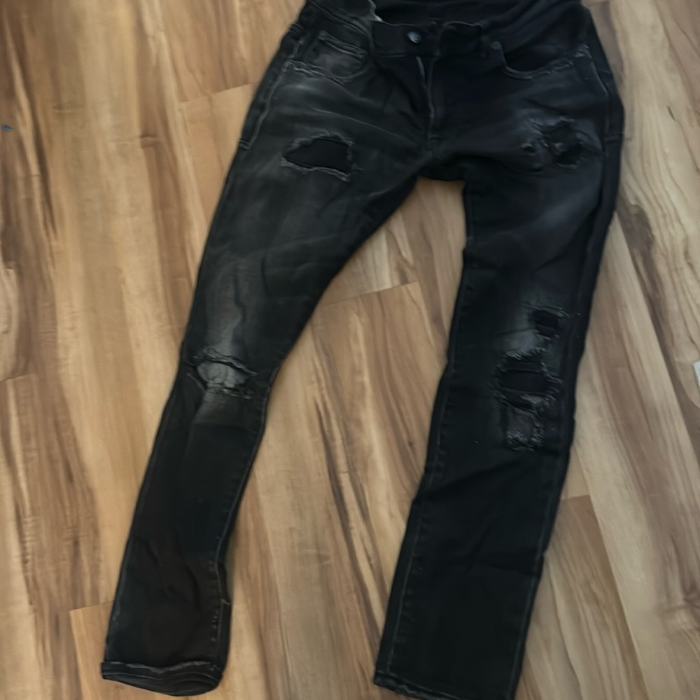 Lightly worn faded black women’s jeans size 27. Brand name: R13